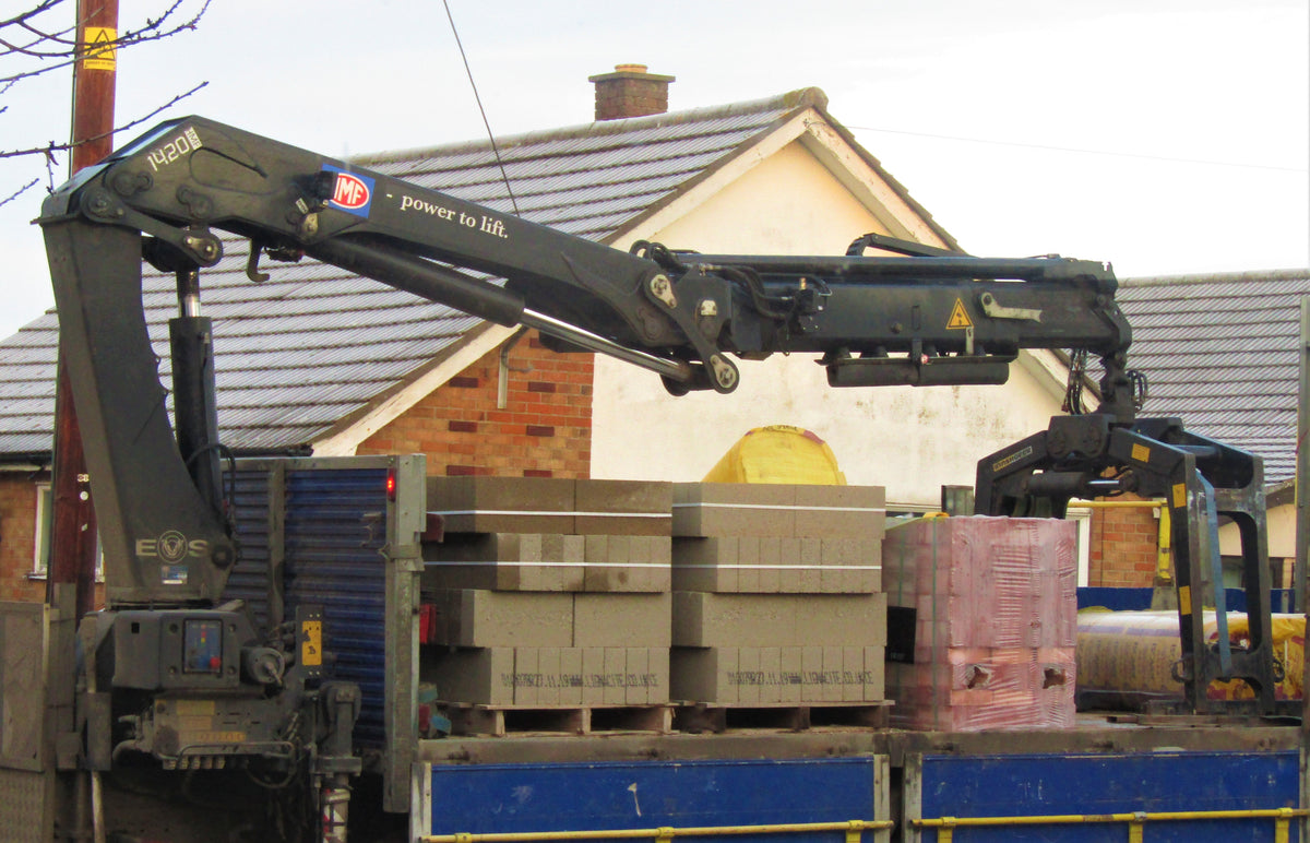 truck delivering building materials