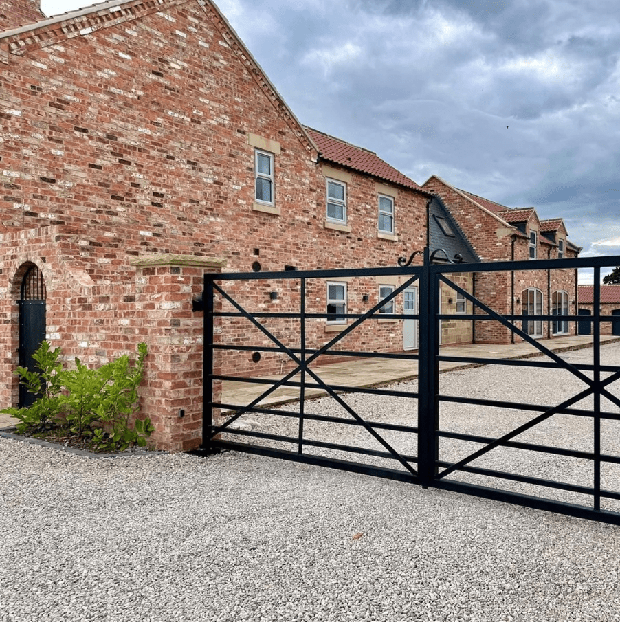 cheshire_wire_cuts_bricks_gate_and_house